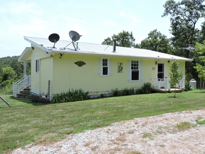 Off the Grid Home on Acreage Near Bull Shoals Lake for Sale - image 1