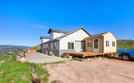 Beautiful Views From This Mountain Home - image 3