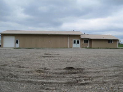 65,936 sq ft Facility with Large Parking Area and Garage - image 1