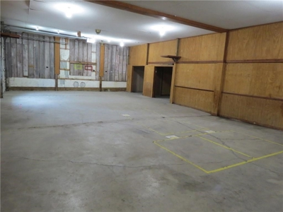 65,936 sq ft Facility with Large Parking Area and Garage - image 12