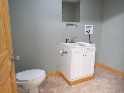 65,936 sq ft Facility with Large Parking Area and Garage - image 6