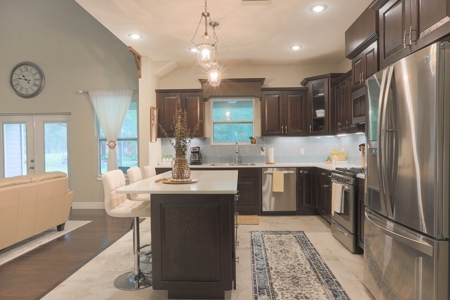 Lavish Living In Winding River Subdivision! - image 21