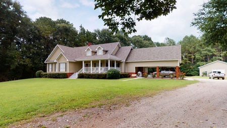 Country home with 44 acre, pool, pond and shop. - image 1