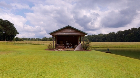 Country home with 44 acre, pool, pond and shop. - image 5