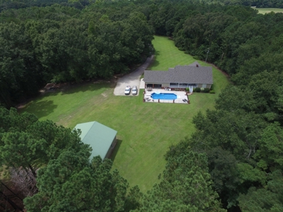 Country home with 44 acre, pool, pond and shop. - image 33