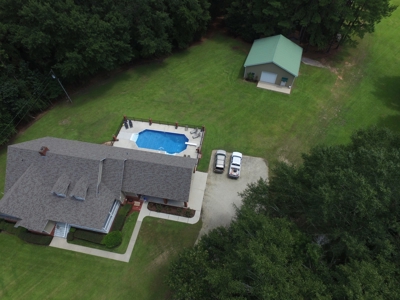 Country home with 44 acre, pool, pond and shop. - image 32