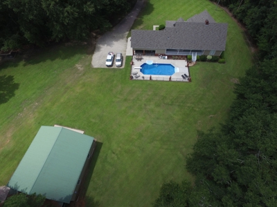 Country home with 44 acre, pool, pond and shop. - image 34