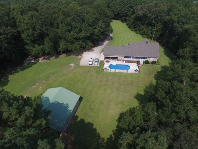 Country home with 44 acre, pool, pond and shop. - image 23