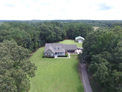 Country home with 44 acre, pool, pond and shop. - image 27