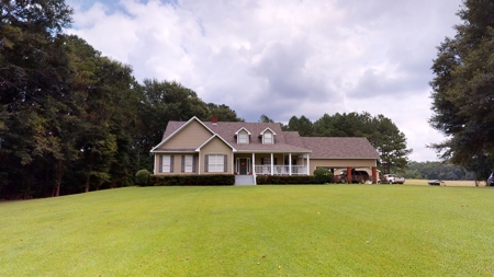 Country home with 44 acre, pool, pond and shop. - image 2