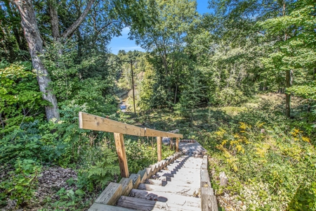 Custom Log Home For Sale Minutes From Grant, MI! - image 31