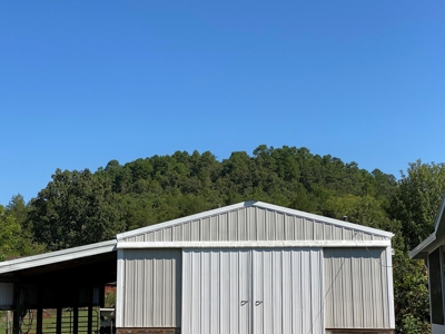 Arkansas Acreage With Big Spring - image 3