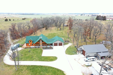 Luxury Log Home For Sale in Southern Iowa with Pasture - image 1