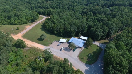 Unrestricted Land With Building For Sale In Hardin County - image 1