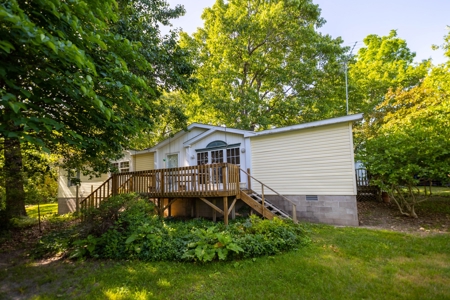 Year Round Creek on 30 Acre Land with Two Homes For Sale - image 1