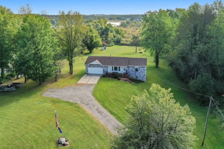 Outdoor Paradise! Just shy of 10 acres with lake frontage - image 4