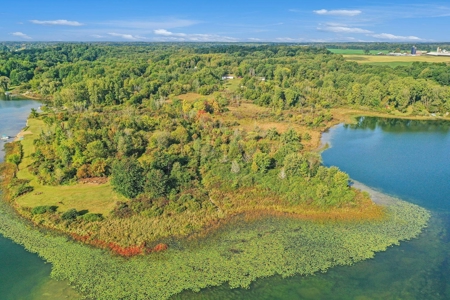 Outdoor Paradise! Just shy of 10 acres with lake frontage - image 33