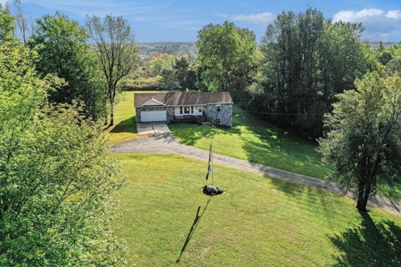 Outdoor Paradise! Just shy of 10 acres with lake frontage - image 3