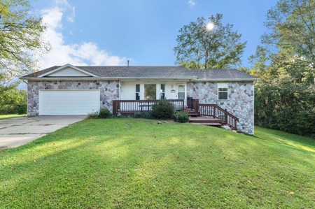 Outdoor Paradise! Just shy of 10 acres with lake frontage - image 2