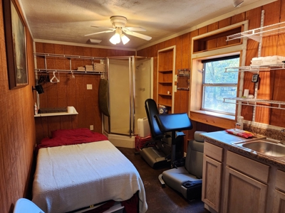 Earthship Home & 45 Acres Adjoining National Forest - image 37
