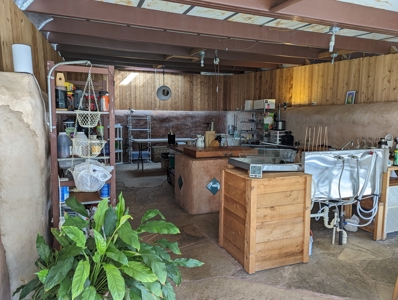 Earthship Home & 45 Acres Adjoining National Forest - image 11