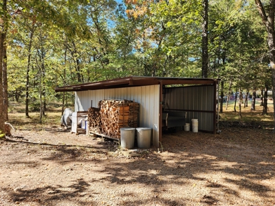 Earthship Home & 45 Acres Adjoining National Forest - image 31