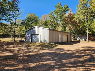 Earthship Home & 45 Acres Adjoining National Forest - image 23