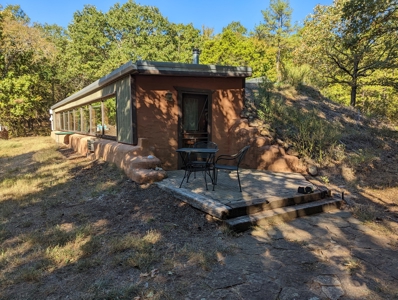 Earthship Home & 45 Acres Adjoining National Forest - image 3