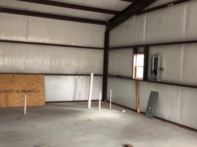 Outstanding Commercial Lot with New Shop on HWY 59 S - image 10