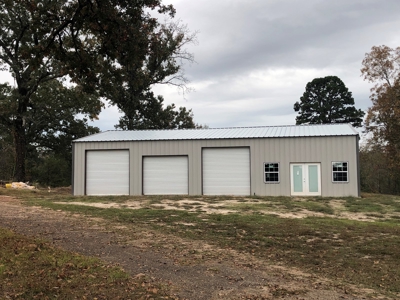 Outstanding Commercial Lot with New Shop on HWY 59 S - image 9