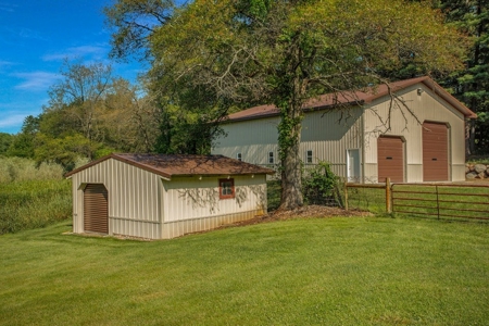 Country estate located on 67-acres with ponds and stream - image 30