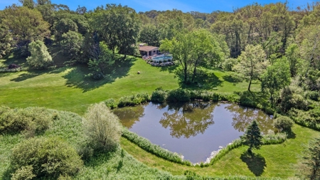Country estate located on 67-acres with ponds and stream - image 44