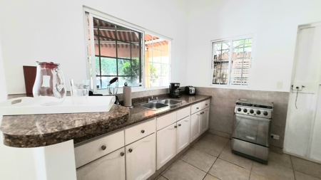 Open Concept home with garden, pool and cozy social areas - image 8