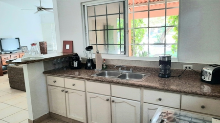 Open Concept home with garden, pool and cozy social areas - image 7
