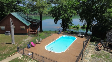 Riverfront Log Cabins For Sale In Mountain View, Arkansas - image 8