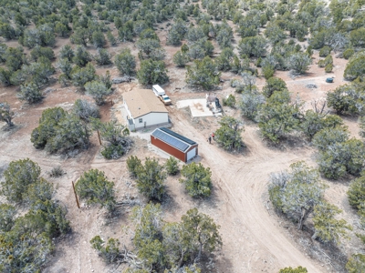 This remote, off grid 3bd2ba home on 36 acres has a well ! - image 39