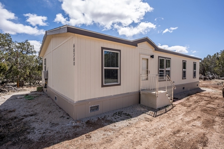 This remote, off grid 3bd2ba home on 36 acres has a well ! - image 3