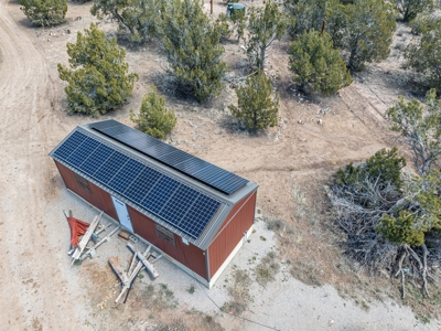 This remote, off grid 3bd2ba home on 36 acres has a well ! - image 38