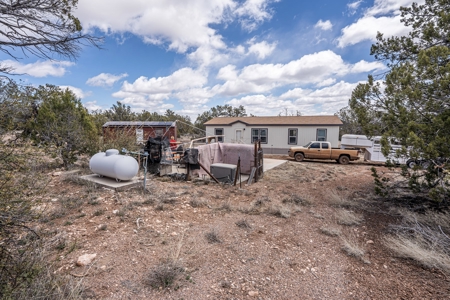 This remote, off grid 3bd2ba home on 36 acres has a well ! - image 27