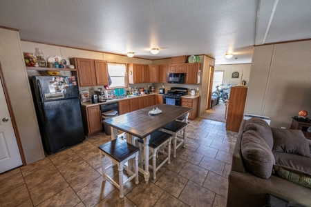 This remote, off grid 3bd2ba home on 36 acres has a well ! - image 19