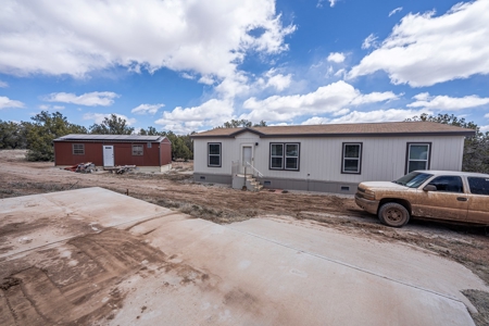 This remote, off grid 3bd2ba home on 36 acres has a well ! - image 24