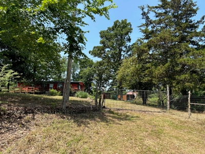 1 Acre With Mobile Home W/ 10'X52' Add-On, Storage Buildings - image 2