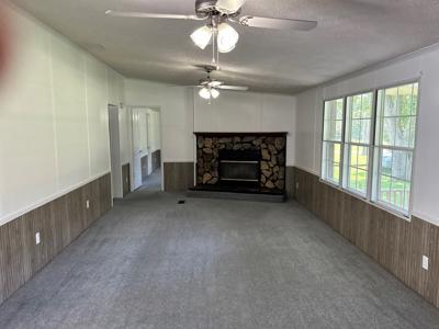 Very nice mobile home on 1 acre with carport and storage - image 8