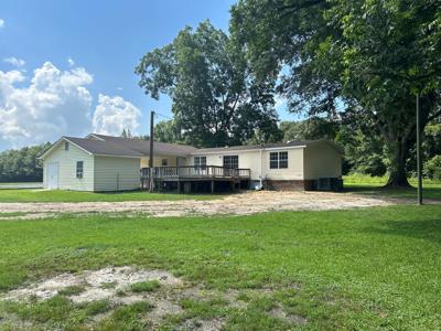 Very nice mobile home on 1 acre with carport and storage - image 6