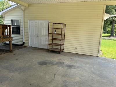 Very nice mobile home on 1 acre with carport and storage - image 29