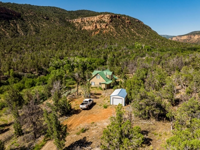 Looking for an off-grid cabin on a creek with 60 acres? - image 8