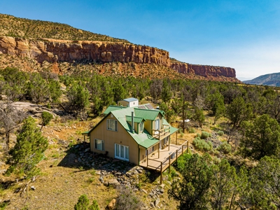 Looking for an off-grid cabin on a creek with 60 acres? - image 1