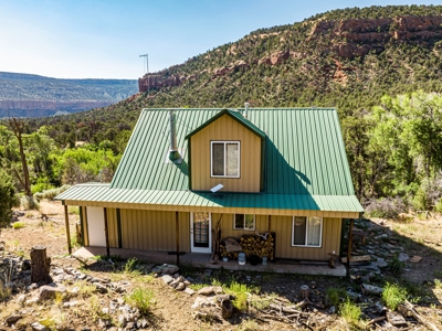 Looking for an off-grid cabin on a creek with 60 acres? - image 4