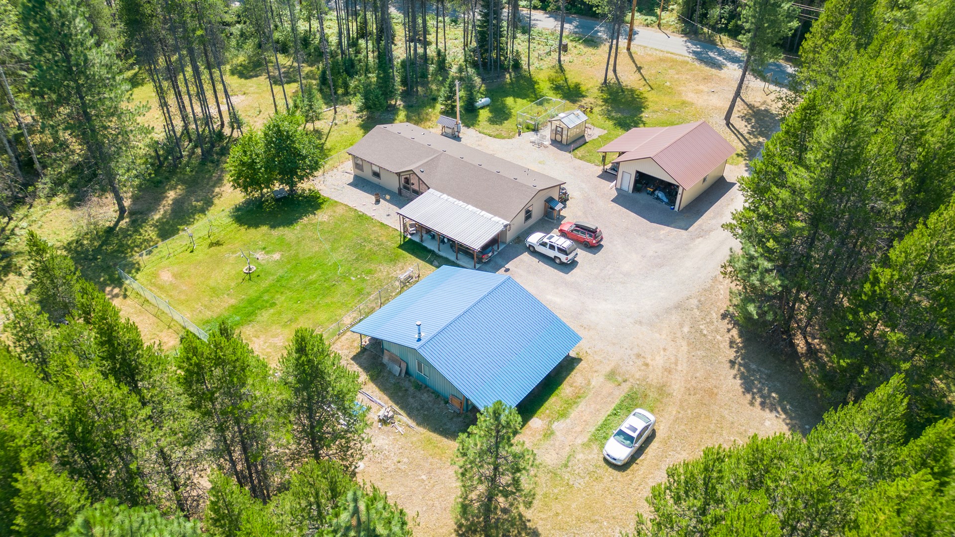 Ranch style home on 1 acre with two shops!