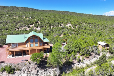 Mountain Home with Cabin on Acreage and Borders BLM For Sale - image 1